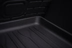 Black textured TPE car floor mat with anti-slip grooves for durable protection.