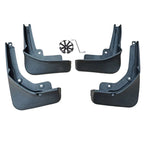 Set of four durable matte black plastic car mud guards with installation hardware.