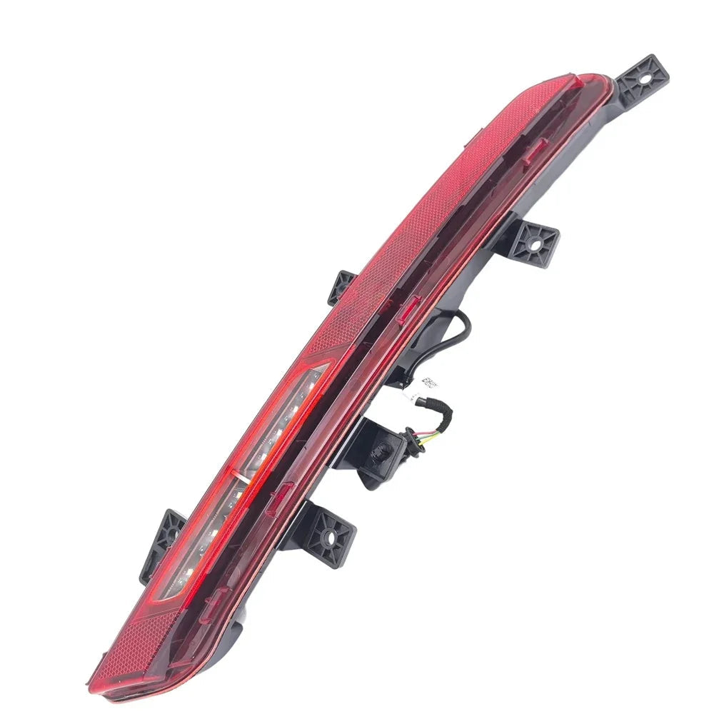 Red LED rear tail light assembly with durable black plastic housing and wiring harness.