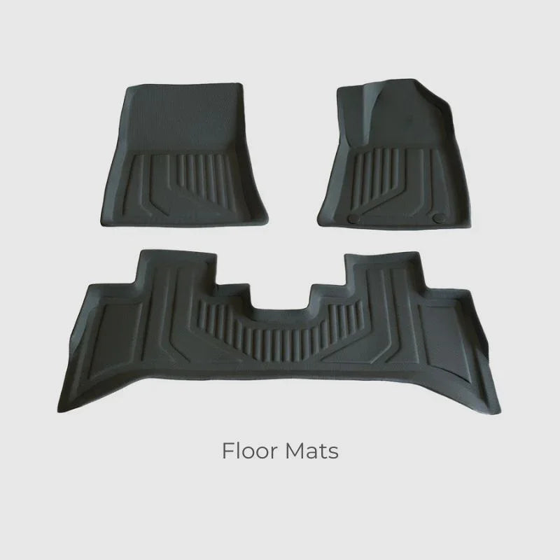 Custom-fit black heavy-duty TPE rubber floor mats with textured anti-slip pattern.