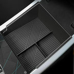 Black silicone car center console organizer tray with non-slip ribbed texture.