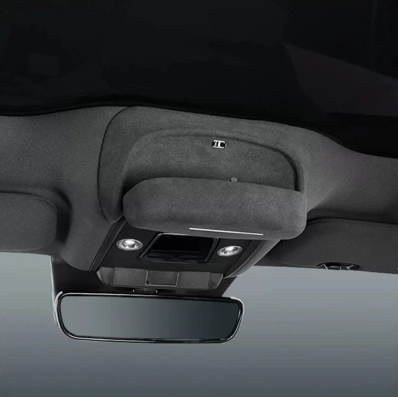 Premium grey fabric car headliner and sun visor with integrated interior lighting.