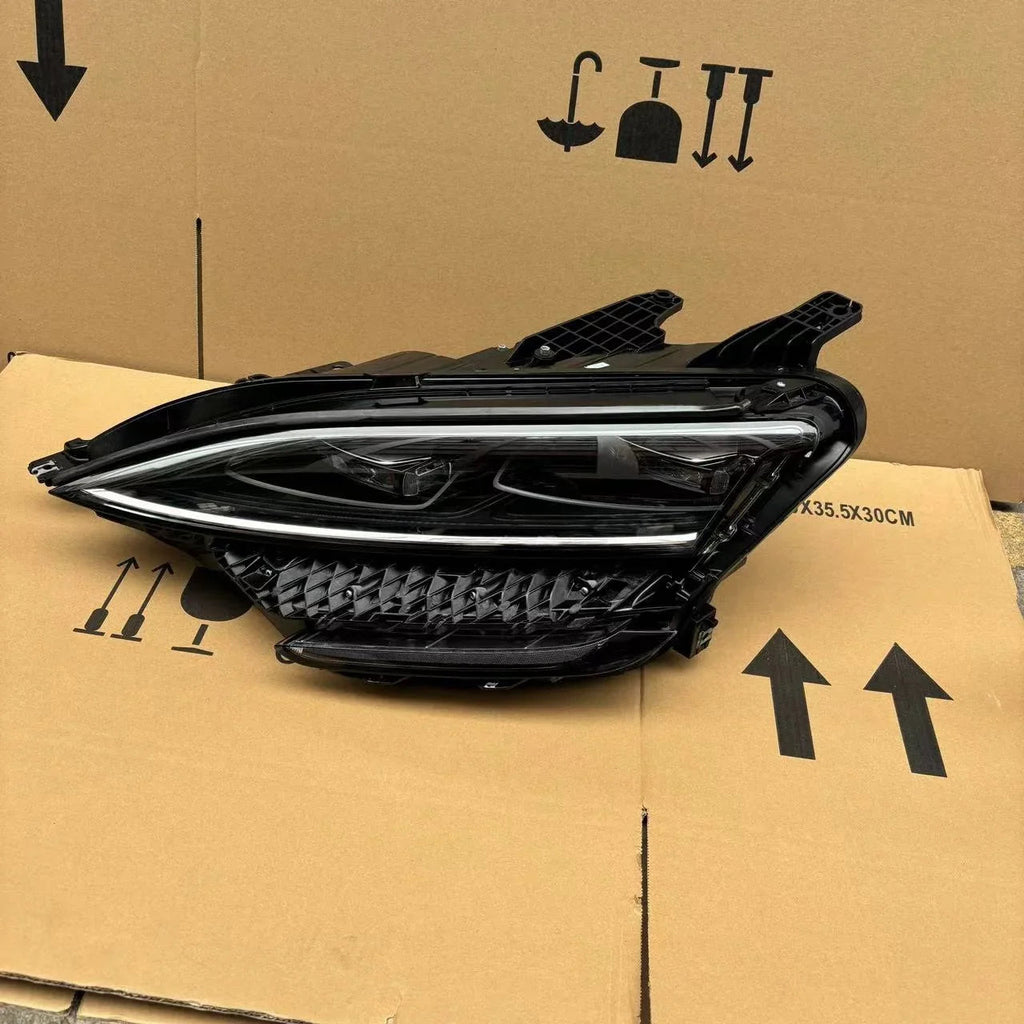 Sleek black aftermarket LED headlight assembly for BYD, featuring a high-gloss finish.