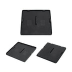 Set of black textured anti-slip rubber mats for BYD car interior compartments.