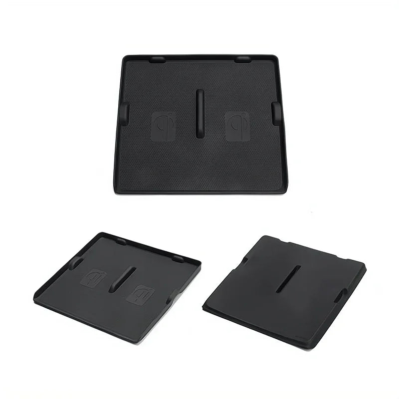 Set of black textured anti-slip rubber mats for BYD car interior compartments.