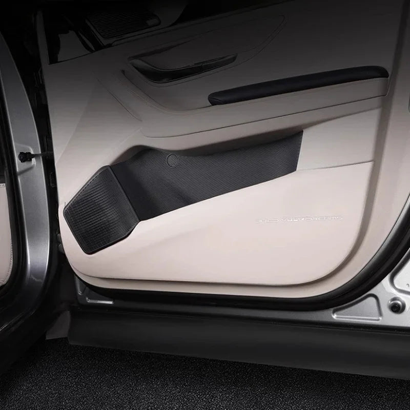 Premium cream-colored leather door panel protector with black textured trim for BYD interior.