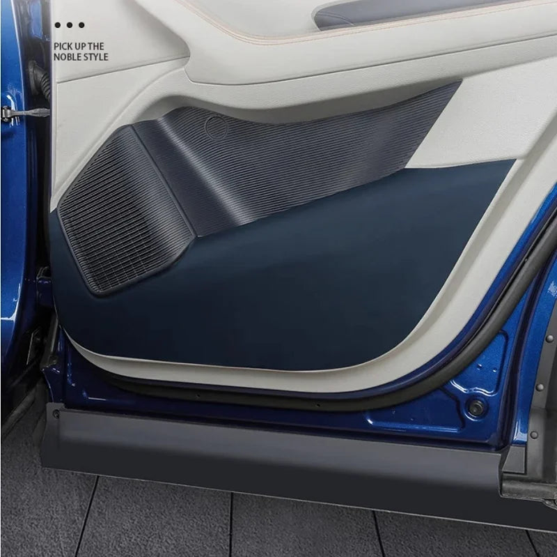 Dark blue textured leather car door trim panel with premium matte finish for BYD interior.