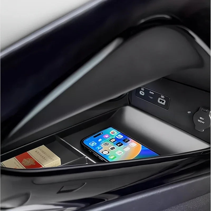 Black high-quality center console storage organizer with smartphone and accessory compartments.