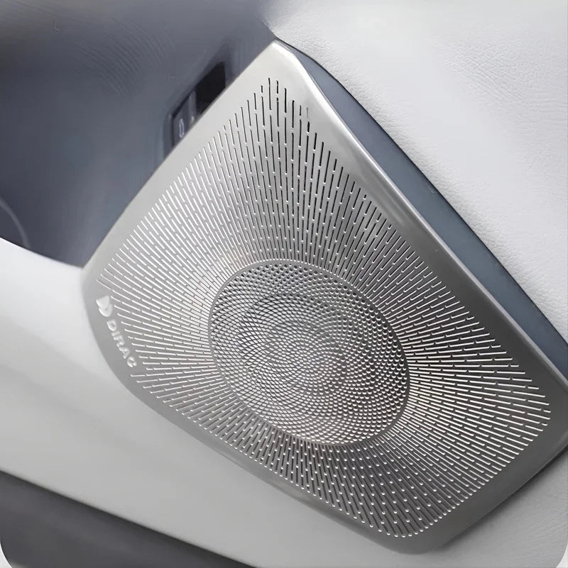 Premium silver metallic speaker grille with a precision-perforated pattern for BYD car interiors.
