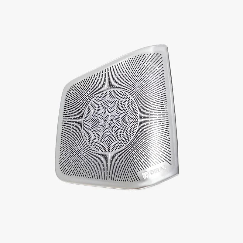 Silver metallic Dirac-tuned speaker grille with a radial perforated pattern.