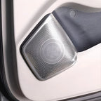 Silver metallic door handle cover with textured anti-scratch finish for BYD interior protection.