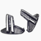 Black glossy aerodynamic car vent trim accessories with a sleek slatted design.