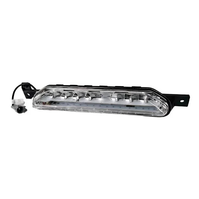 Clear LED daytime running light bar with black housing and integrated wiring connector.