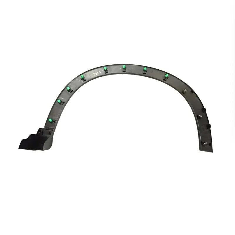 Black plastic curved wheel arch liner with green mounting clips for automotive protection