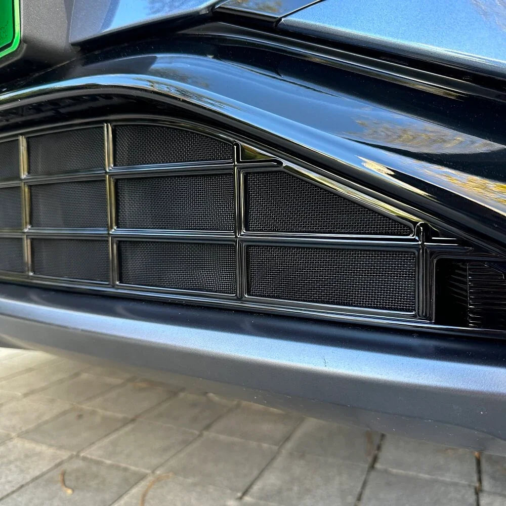 Glossy black mesh front bumper grille with a durable, textured protective design.