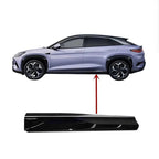 Black carbon fiber texture side skirt protector for BYD electric SUV.
