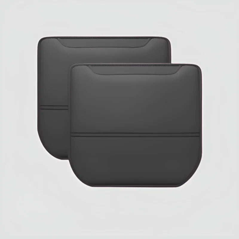 Pair of professional grey faux-leather car seat cushions with a sleek, contoured design.