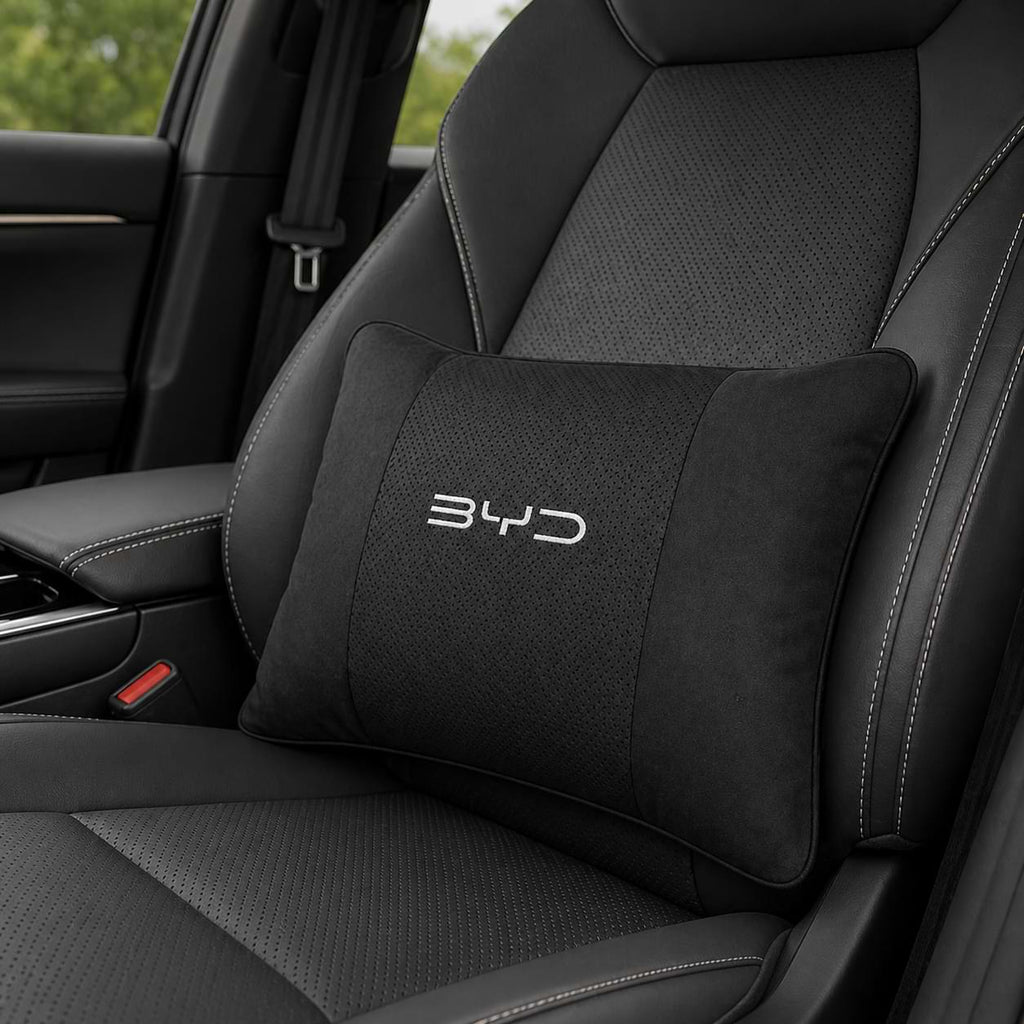 Black car pillow with BYD logo on a black car seat