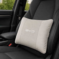Gray car pillow with BYD logo on a car seat