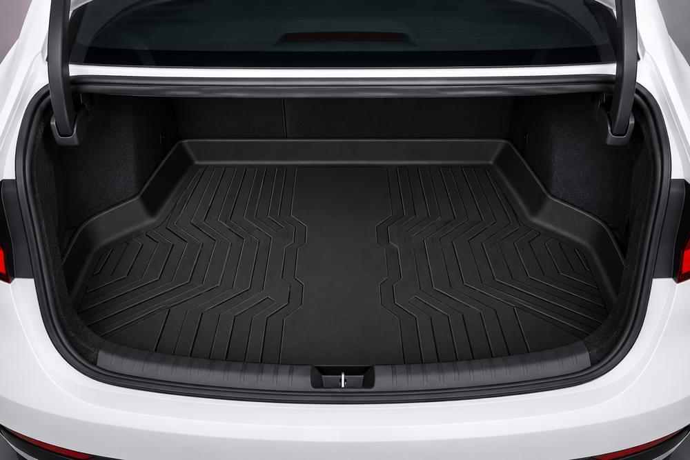 BYD_SEAL Car trunk with a black cargo liner on a white car background