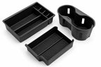 Three black car organizers on a white background