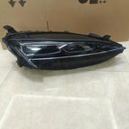 Sleek black aftermarket LED headlight assembly with a glossy finish for enhanced car visibility.