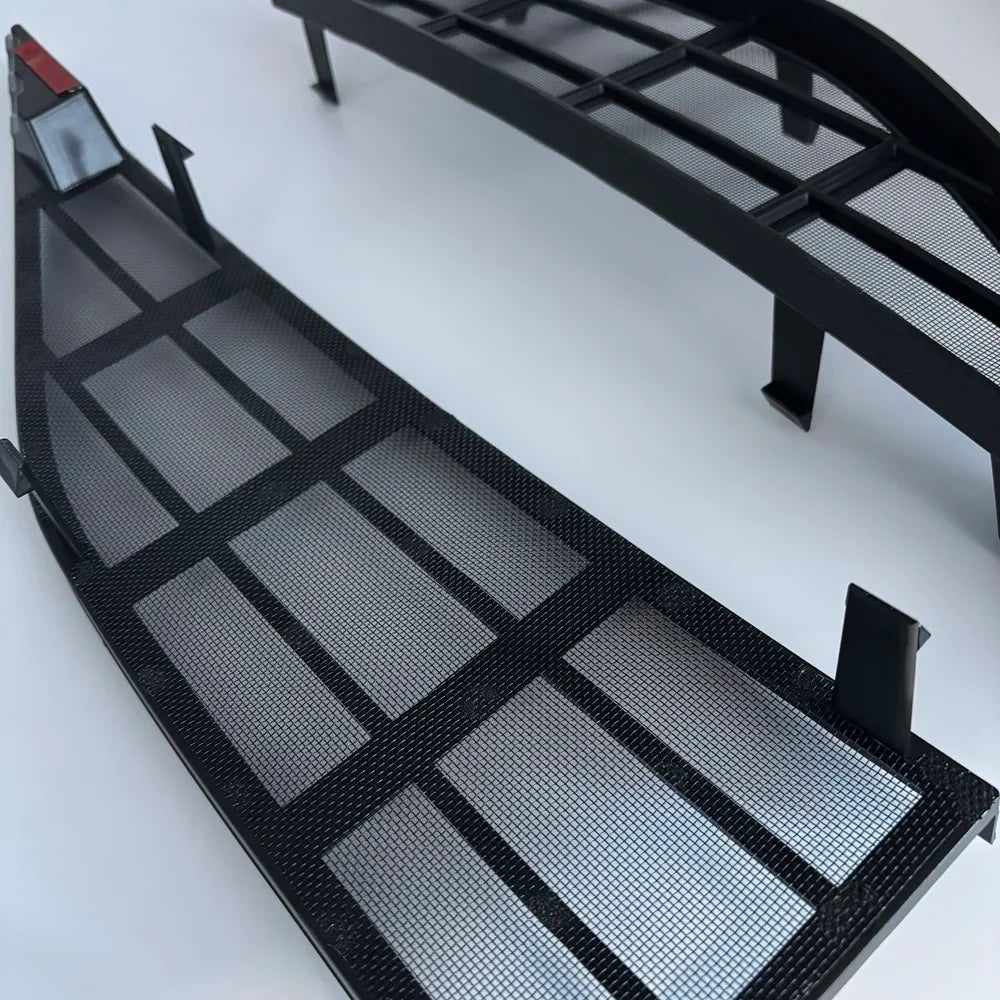 Black carbon fiber textured front grille mesh inserts for BYD aftermarket protection.