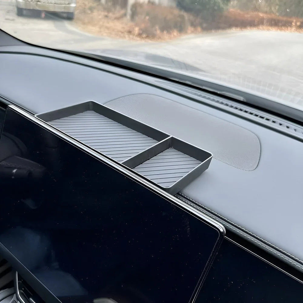 Black textured EVA dashboard storage tray organizer for BYD interior protection.