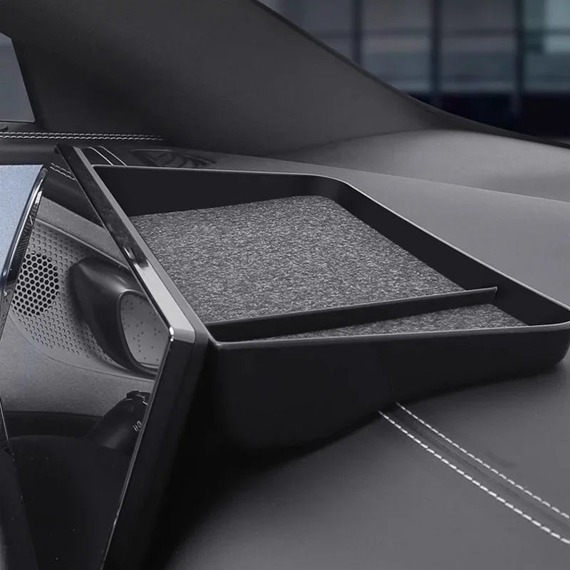 Black matte storage tray with grey anti-slip lining for BYD car interior.