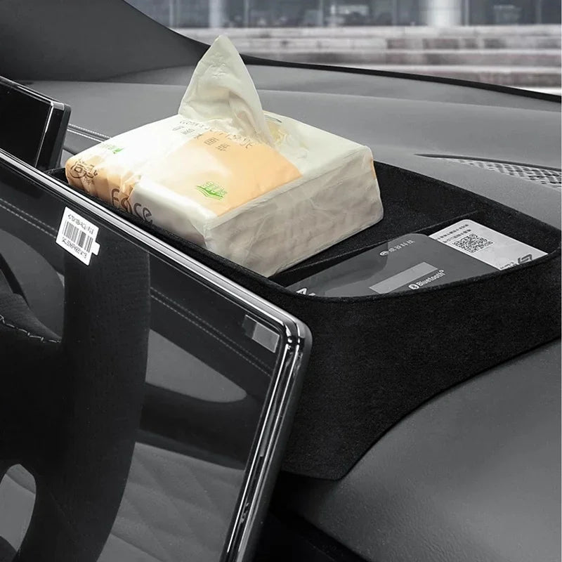 Black felt car dashboard organizer holding a tissue box and smartphone