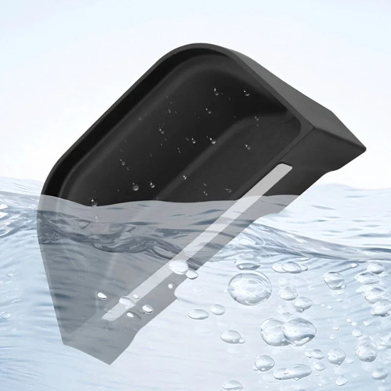 Waterproof black matte car trunk tray liner protecting against spills and moisture.