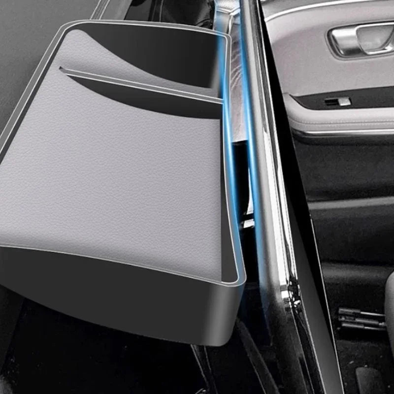 Black leather car door pocket organizer with integrated storage compartment for BYD interior.