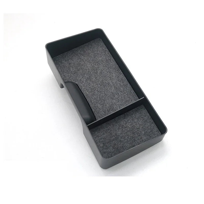 Black plastic car center console organizer tray with grey felt lining