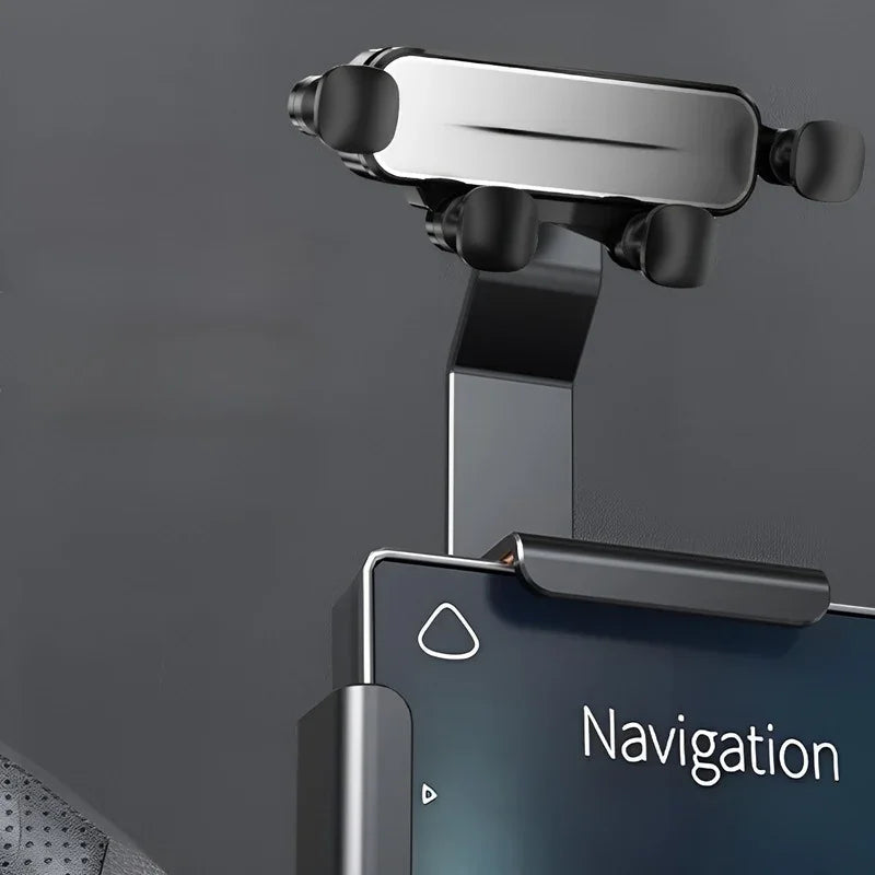 Sleek black and silver metal car phone holder mounted on a dashboard for navigation.