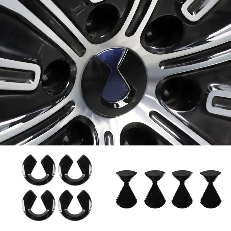 Black and silver alloy wheel rim with blue center cap and matching decorative trim pieces.