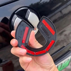 Black and red aftermarket BYD fuel cap cover made of durable material