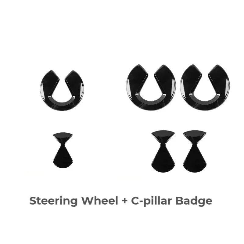 Glossy black steering wheel and C-pillar badge accessory set for BYD cars