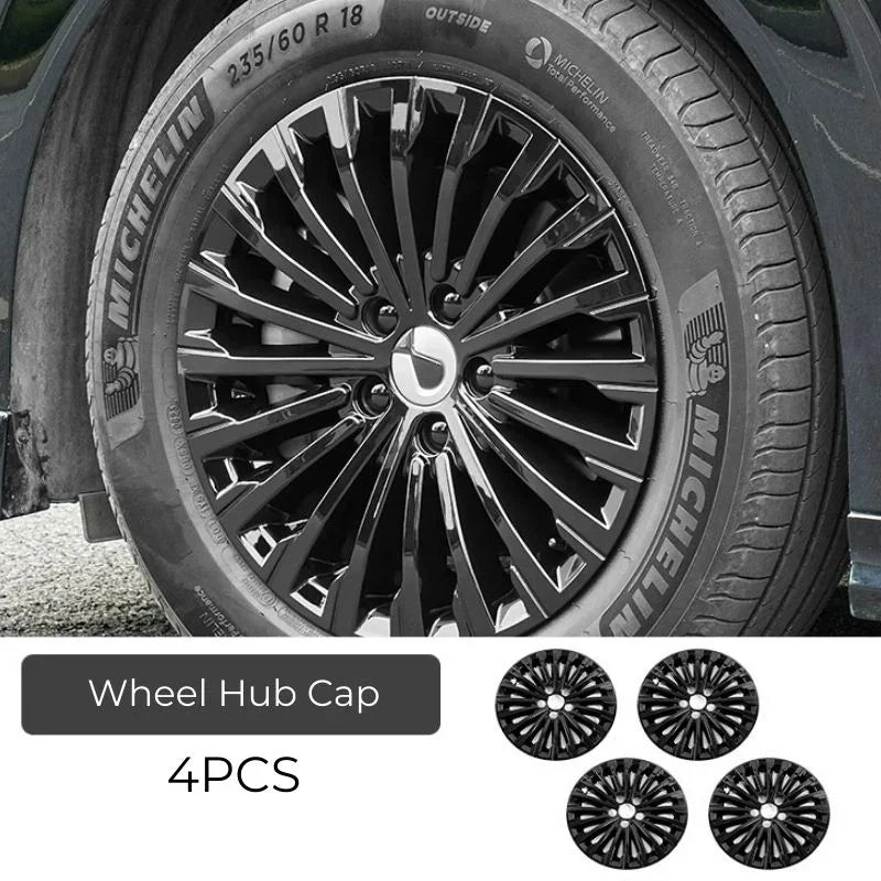 Set of 4 black glossy plastic wheel hub caps for BYD vehicles, shown on a Michelin tire.