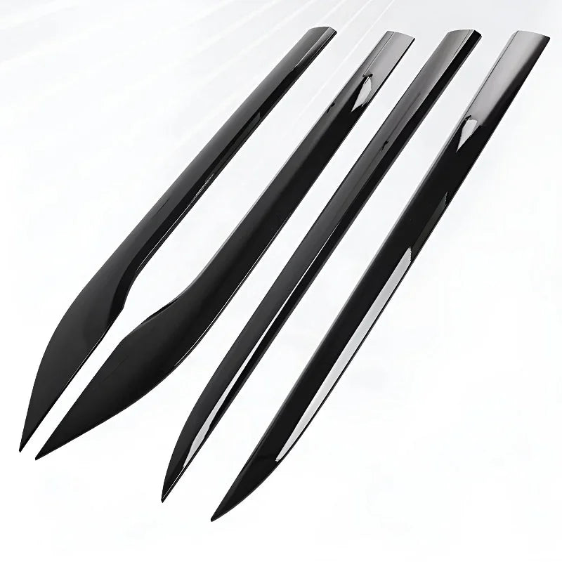 Four sleek glossy black door sill protector guards made of durable premium material.