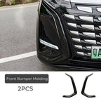 Two-piece black glossy front bumper molding trim for BYD car exterior protection.