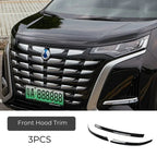 Three-piece black glossy front hood trim set for vehicle protection and styling.
