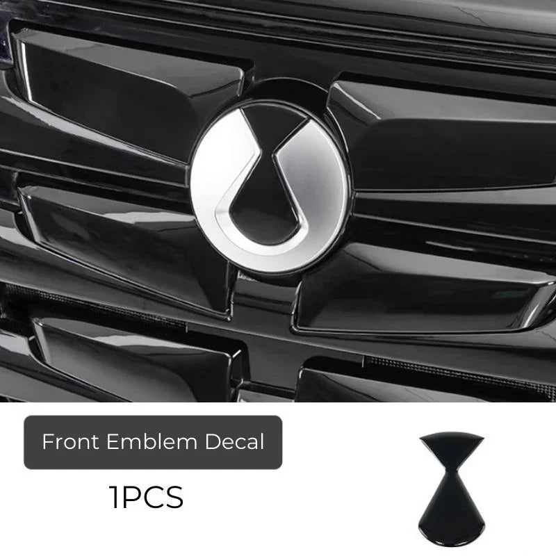 Silver and black front emblem decal for BYD vehicle grille.