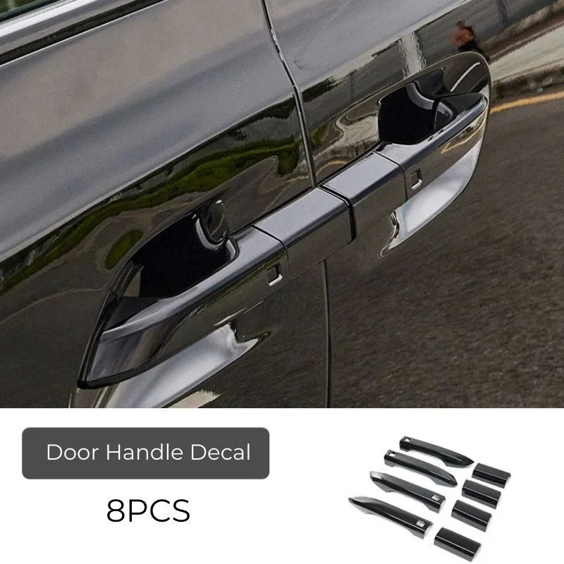 Set of 8 black protective door handle decals for BYD cars to prevent scratches and wear.