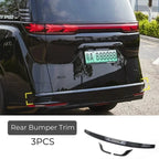 Black 3-piece ABS rear bumper trim set for BYD, providing a sleek and protective finish.