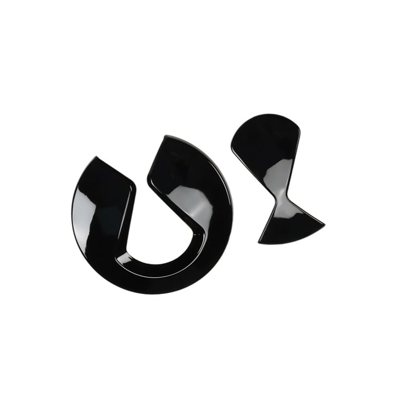 Glossy black high-quality acrylic decorative car emblems with a smooth polished finish.