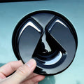 Glossy black high-quality plastic car accessory with a sleek, curved ergonomic design.