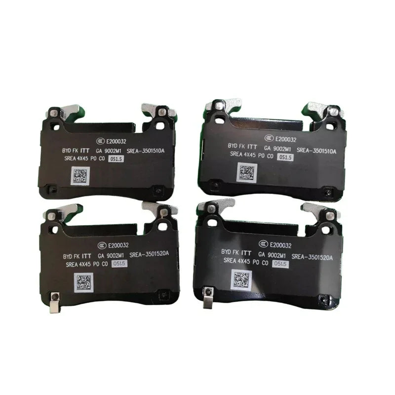 Set of four premium black ceramic brake pads with silver metal clips for BYD vehicle braking.
