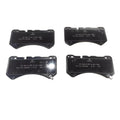 Set of four black high-performance ceramic brake pads for BYD vehicles.