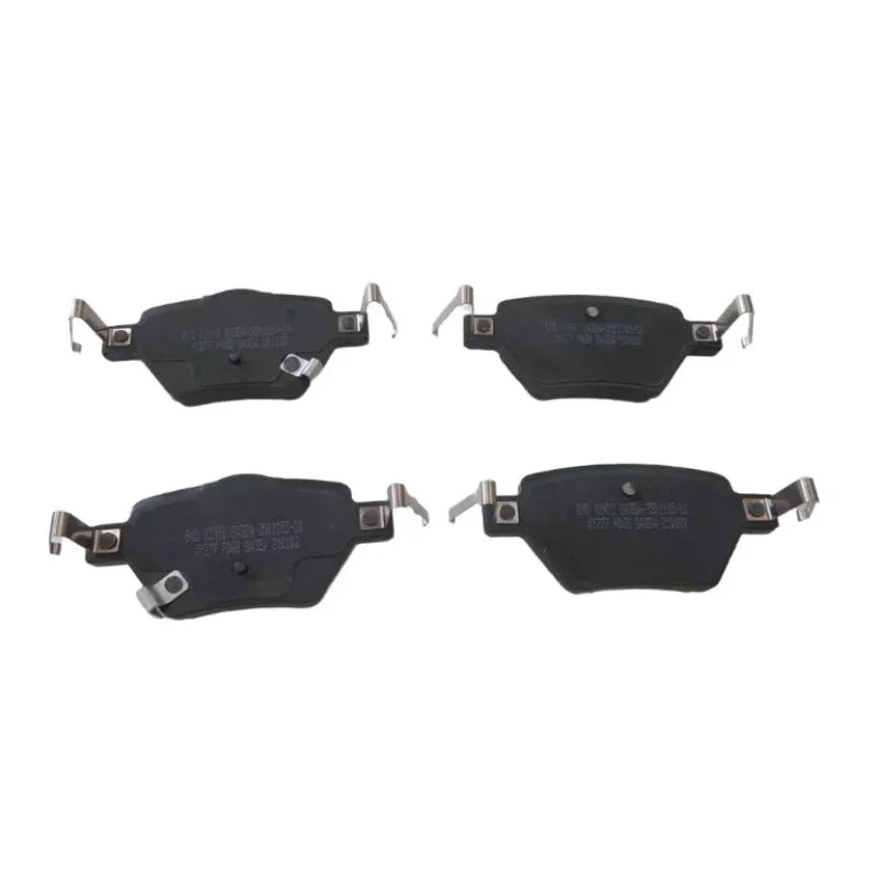 Set of four premium black ceramic brake pads with metal clips for BYD vehicle maintenance.