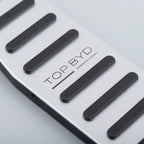 Silver brushed aluminum pedal cover with black non-slip rubber grips for BYD accessories.